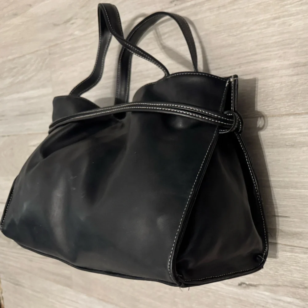 Black Top Handle Bag with White Stitching